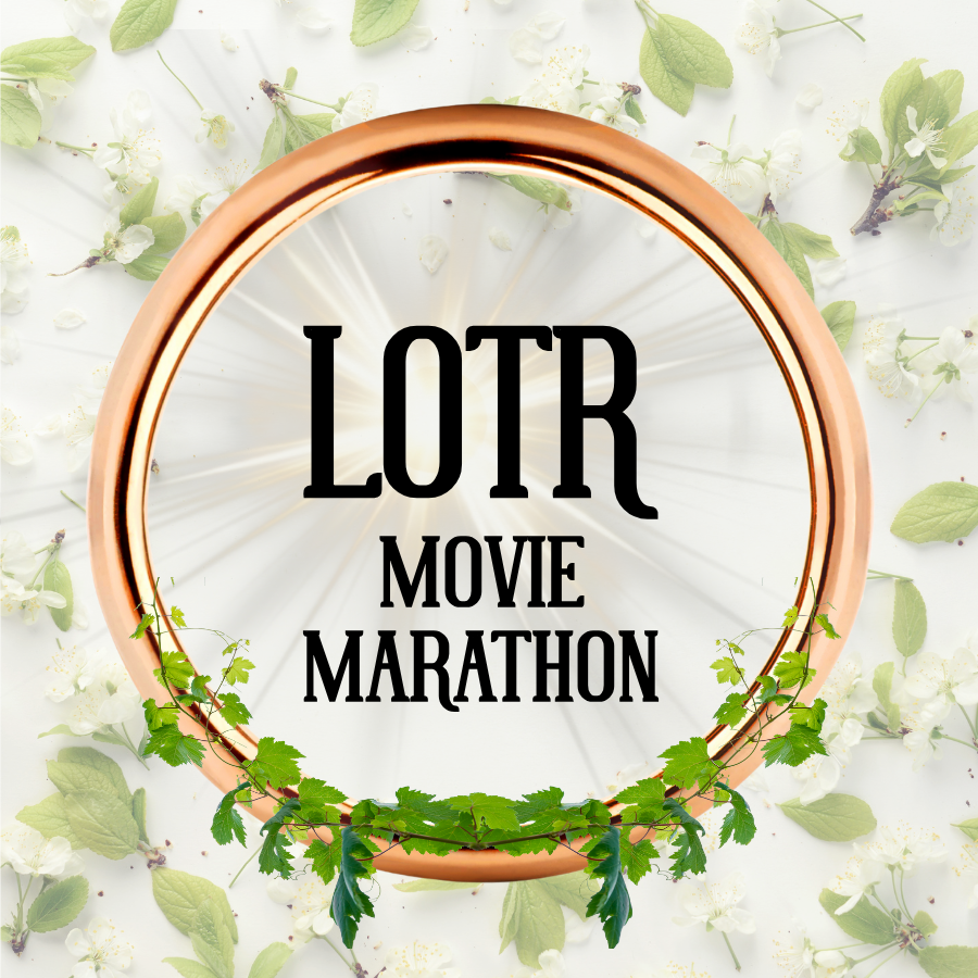 Copper ring with "LOTR Movie Marathon" text surrounded by white flowers and green leaves.
